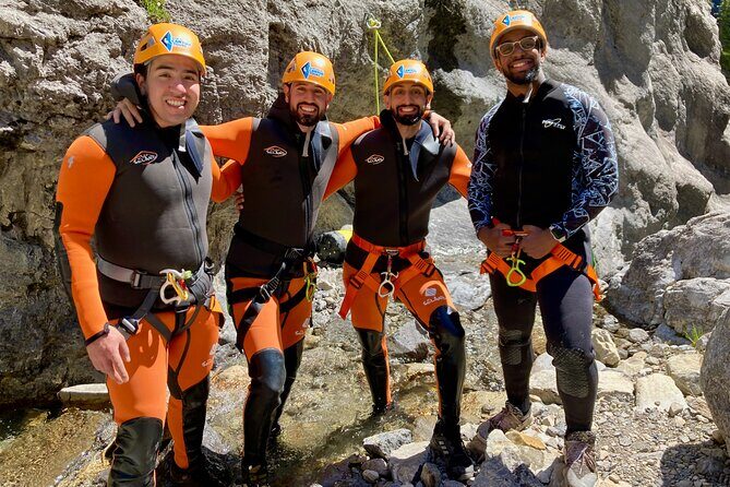 Banff Canyoning - Ghost Canyon (Intermediate Level) - Down in the canyon: four rappels, slides, and the fun parts
