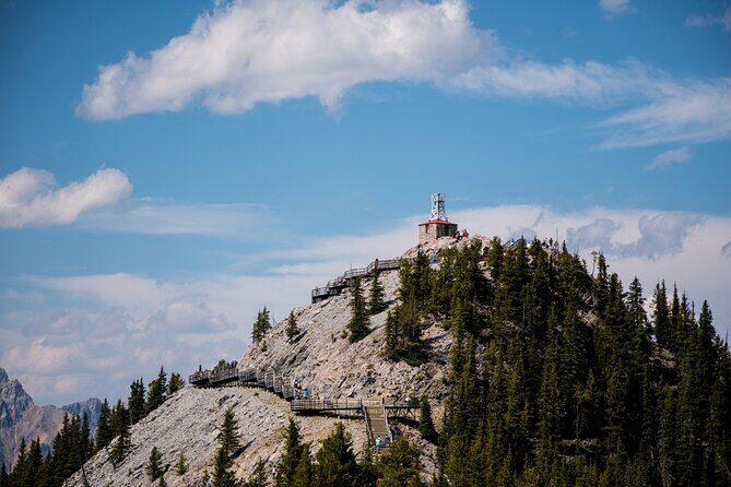 Banff Cave & Hot Springs Audio Walking Tour (Not a Ticket) - Entering the Cave and Basin: Warm Springs and Living History