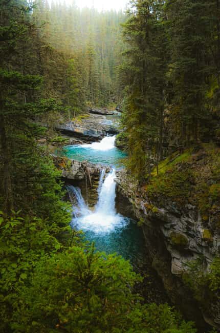Calgary: Banff Top Lakes Tour with Banff Town Visit - Johnston Canyon Lower and Upper Falls: where your legs earn the mist