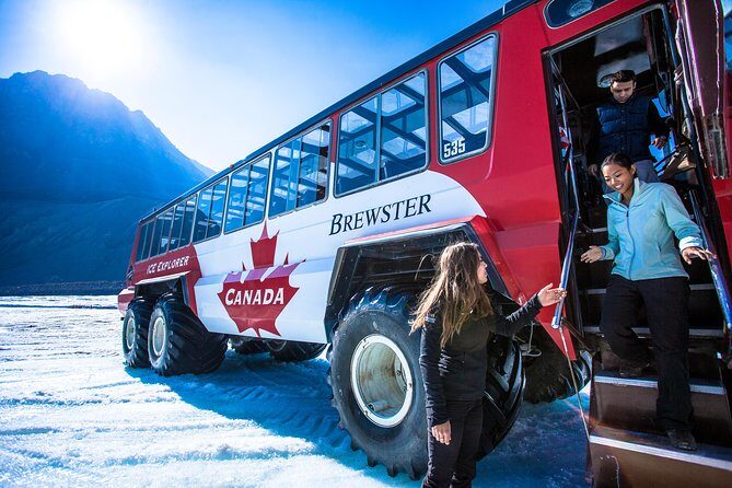 Columbia Icefield Tour with Glacier Skywalk - Glacier walk at Athabasca: walking on ice and grabbing glacier-water tips
