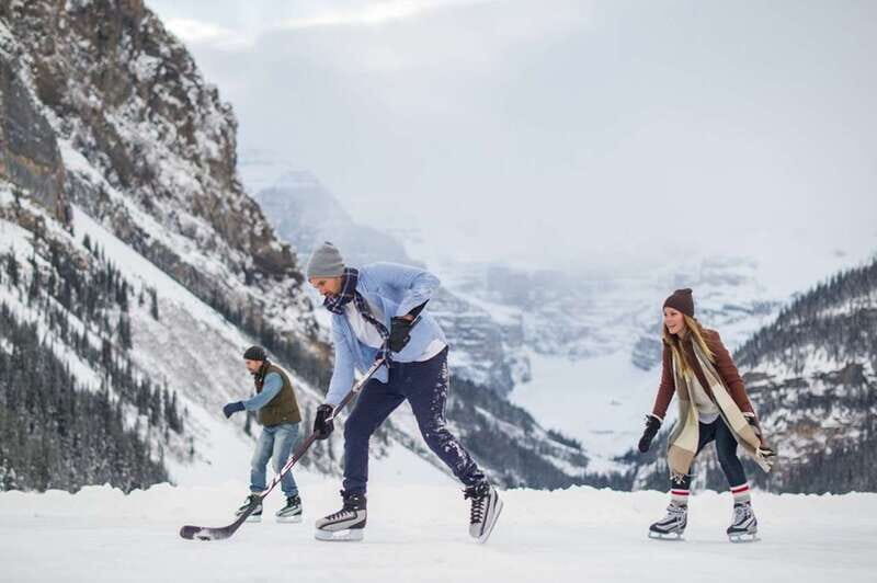 From Banff: Winter Wonderland; Lake Louise & Johnston Canyon - Lake Louise ice skating: the iconic view plus real winter movement