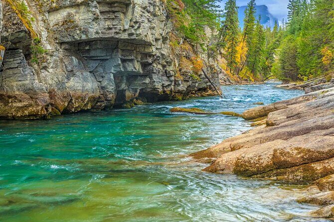 Jasper and Columbia Skywalk Icefield Parkway Private Day Tour - Athabasca Falls: Short stop, big power